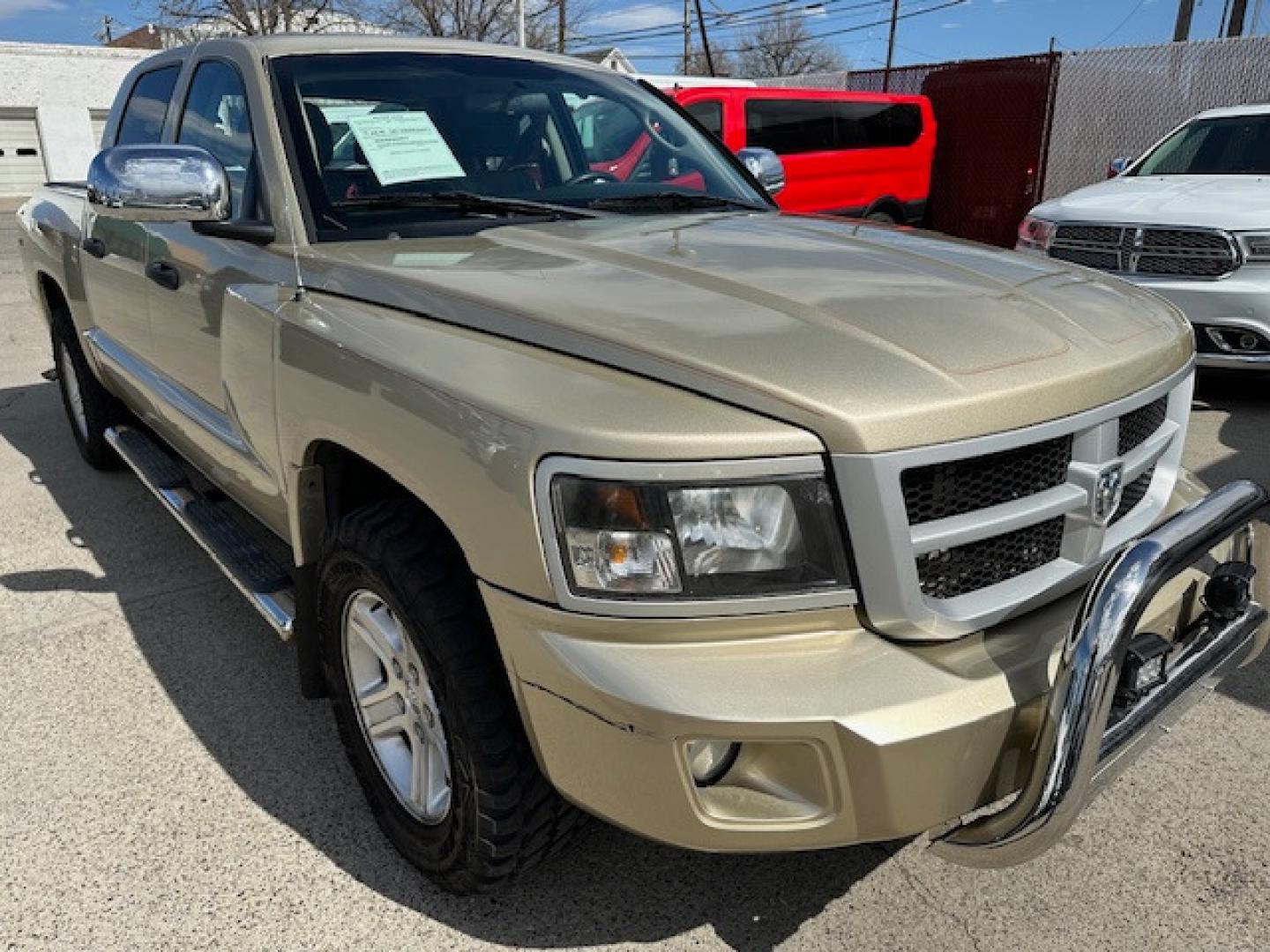 2011 /BEIGE Dodge Dakota SLT (1D7RW3GK3BS) with an 3.7 V6 engine, Automatic transmission, located at 3200 1st Avenue North, Billings, MT, 59101, (406) 245-9055, 45.779270, -108.510742 - Very Nice 4 Door Pickup with A Ton of Options! Power Windows, Power Door Locks, Remote Key Entry, Rugged Terrain Tires, Tilt Steering Column, Cruise Control, 4X4, Running Boards, Tonneau Cover, Towing, Custom Bumper Guard and Only 79,000 Miles. CarFax Dealer Auto Brokers of Montana/AA&A Auto Ren - Photo#2